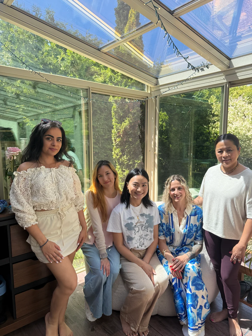 Participants gathered together in the sunroom