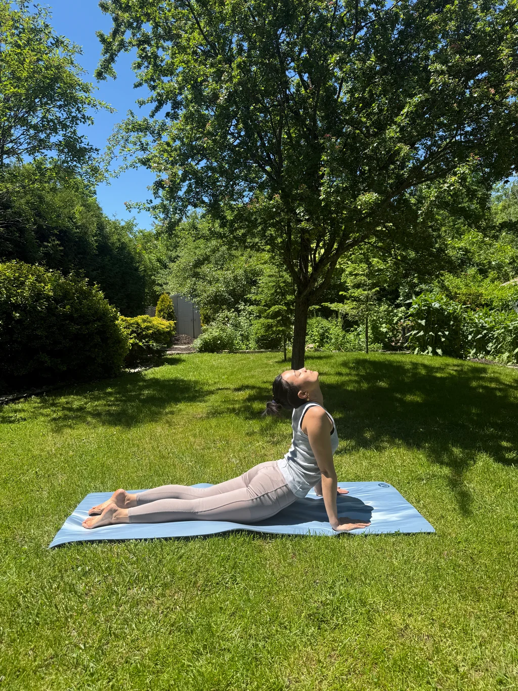 A gentle yoga stretch on the lawn