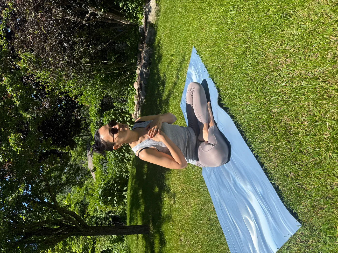 Nomin meditating on the phone, ready to follow along